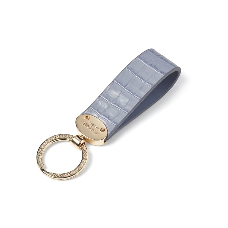 Aspinal of London Oval Loop Keyring in Deep Shine Sky Blue Small Croc